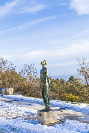 BAD FRANKENHAUSEN - JAN 9, 2016: sculpture in front of panorama museum in Bad Frankenhausen, Germany. The statues symbolize the suffering of the farmers in medieval times and the cruelty of the king.のeditorial素材