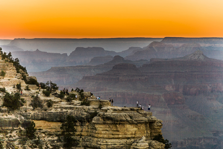 GRAND CANYON, USA - JULY 8, 2008: people enjoy the scenic view from mathers point to the Grand Canyon in sunset. The Grand Canyon is the most visited nature scenic spot in america.のeditorial素材