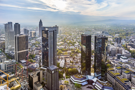 FRANKFURT, GERMANY - MAY 2, 2015: view to financial district in Frankfurt, Germany. The skyscrapers are the symbol for Frankfurt. The citx is also called Mainhattan.のeditorial素材