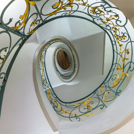public spiral staircase in an old house