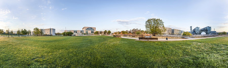 panorama of Spreebogen park in Berlin with government buildings in Berlin in early morning lightの写真素材