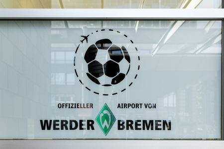 BREMEN, GERMANY - MAY 13, 2016: insignia of WErder Bremen premiere league football club at the airport in Bremen, Germany. Werder Bremen plays in the first german soccer league.のeditorial素材