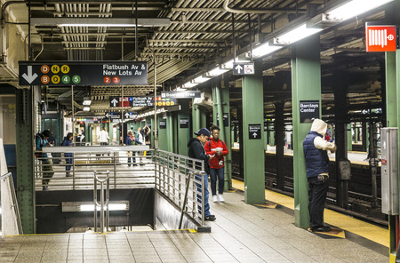 NEW YORK, USA - OCT 21, 2015: People wait at subway station Atlantic Avenue in New York, Brooklyn. With 1.75 billion annual ridership, NYC Subway is the 7th busiest metro system in the world.のeditorial素材