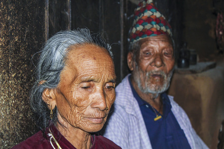 JOMSON, NEPAL - OCT 14, 2013: portrait of old nepalese woman. She wears a nose jewelry as symbol of wealth.のeditorial素材