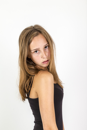 portrait of smiling young beautiful girl with brown hairの写真素材