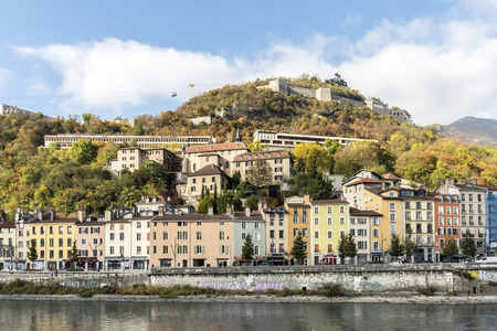 cityscape view with river and bridge in Grenoble city on south-east of Franceの写真素材