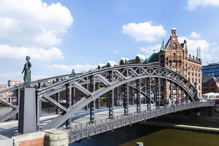HAMBURG, GERMANY - JULY 17, 2014: statue of Europa and Hammonia at the Brooks Bridge of Hamburg under blue skyのeditorial素材