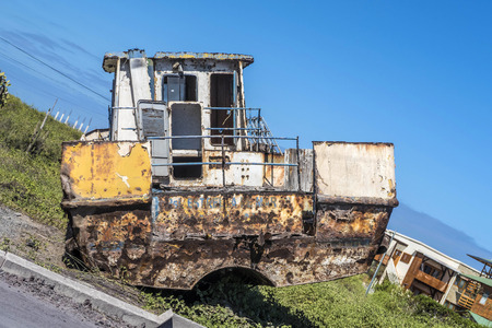old fisher boats decay at the beach and pollute the landscapeの写真素材