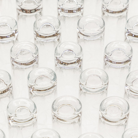 many empty glasses isolated on white backgroundの写真素材