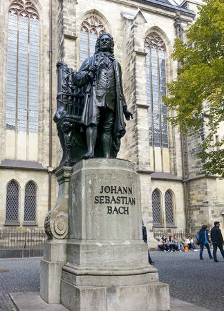 LEIPZIG, GERMANY - AUG 23, 2014:  Bach monument stands since 1908 in front of the St Thomas Kirche church where Johann Sebastian Bach is buried in Leipzig Germanyのeditorial素材