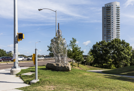 HOUSTON, USA - JULY 11, 2013: statue body of knowledge by jaume plensa in Houston, USA in public area.のeditorial素材
