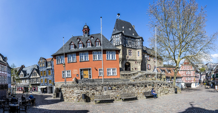 IDSTEIN, GERMANY - APR 4, 2017: people visit scenic half timbered houses and famous Hexenturm in Idstein, Germany.のeditorial素材