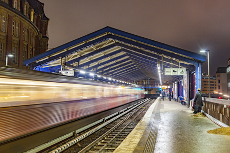 HAMBURG, GERMANY - JAN 19, 2011: people waiting for train at station Roedingsmarkt in direction Barmbek in Hamburg. The Hochbahn was inaugurated in 1911.のeditorial素材