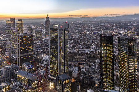 FRANKFURT, GERMANY - JAN 17, 2017: Skyline of Frankfurt with river Main and skyscrapers in the evening.のeditorial素材