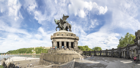 Koblenz, Germany - MAY 21, 2017: Panorama view over the plaza at the German corner/ Deutsches Eck, people visit the monument of Kaiser Wilhelm where the river Mosel joins the Rhine.のeditorial素材