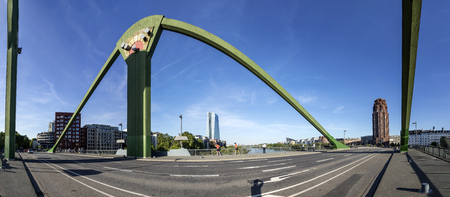 FRANKFURT, GERMANY - MAY 16, 2017: panorama of new headquarters of the European Central Bank with river main, floesser bridge and main plaza skyscraper in Frankfurt.のeditorial素材