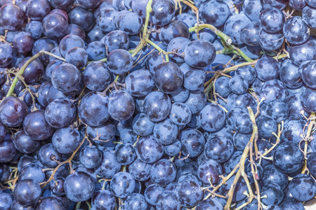grape bunches at a fruit stall at the food market in Franceの写真素材