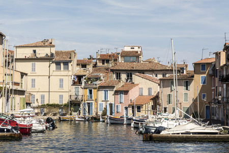 ships anchor in old harbor of Martigues at the french rivieraの写真素材