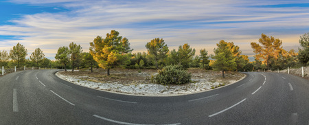 curvy street in rural landscape in the provence, Franceの写真素材