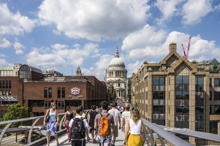 LONDON UK - JUNE 17, 2017: people on the way direction St Paul's Cathedral. It is an Anglican cathedral, the seat of the Bishop of London and the mother church of the Diocese of London, England, United Kingdom.のeditorial素材