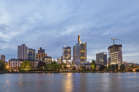 skyline of Frankfurt by night with river Mainのeditorial素材
