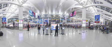 NEW YORK, USA - OCT 7, 2017:  people ready for check in at Terminal 4 in JFK airport, New York. In 1963 the airport was rededicated John F. Kennedy International Airport.のeditorial素材