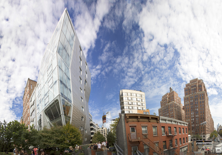 NEW YORK, USA - OCT 7, 2017:  people enjoy the High Line path with  old and new skyscraper. The path...