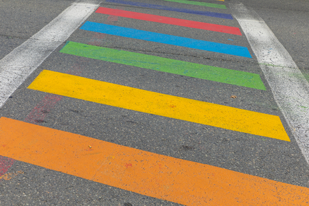 colorful striped pedestrian crossing at the streetの写真素材