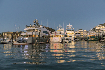 NEWPORT, USA - SEP 23, 2017: luxury yacht in sunset in the harbor of Newport, USA.のeditorial素材