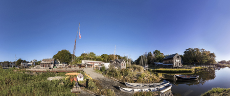 panoramic river landscape with boats and wharf in New England, USAのeditorial素材