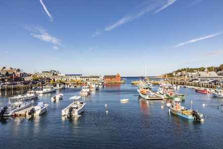 ROCKPORT, USA - SEP 28, 2017: old harbor in Rockport with motor ships under blue skyのeditorial素材