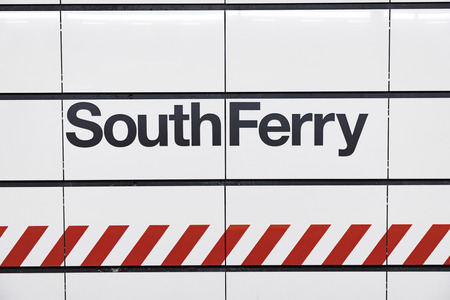 NEW YORK, USA  OCT 5, 2017:  South Ferry sign at a wall. The south ferry is free for everyone and operates every 30 minutes.のeditorial素材