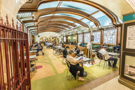 NEW YORK,  USA - OCT 6, 2017: people enjoy the food area in Grand Central Terminal in New York. It is the largest train station in the world by number of platforms: 44のeditorial素材