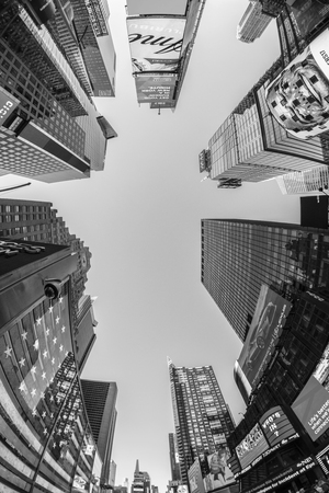 NEW YORK, USA  OCT 4, 2017:  neon advertising of News, brands and theaters at times square in late afternoon. Times square is a symbol for New York life and amusement.のeditorial素材