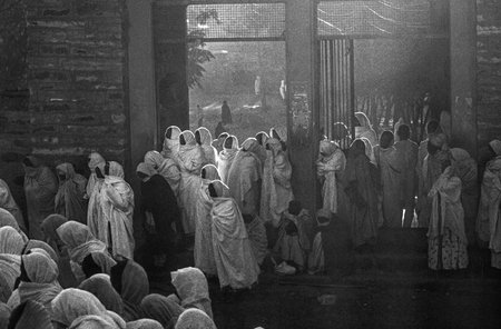 AXUM, ETHIOPIA - APRIL 20: people watch the ceremony of the holy ark y through the streets on April 20,1998 in Axum, Ethiopia. The ark was stolen in Salomons temple by king Menelik.のeditorial素材