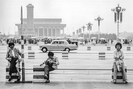 BEIJING, CHINA - SEP 22, 1981: women sit at the Tianmen place in china with very low traffic.のeditorial素材