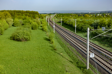 rails in rural green landscape for german high speed train Intercity Express (ICE)の写真素材