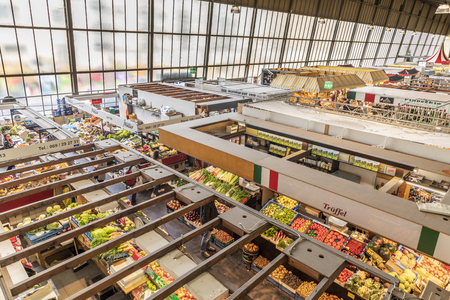 FRANKFURT, GERMANY - APR 30, 2018: people enjoy shopping in the Kleinmarkthalle in Frankfurt, Germany. The hall from 1954 is the most famous fresh food market in Frankfurt on 1500 SQ (m2).のeditorial素材