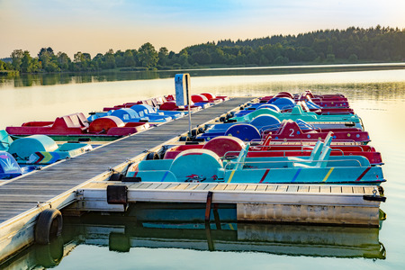 pedalos at lake Losheim in the evening