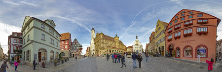 ROTHENBURG, GERMANY - OCT 6, 2018: people visit the central market place in Rothenburg ob der Tauber. It is one of the most famous touristic spots in Germany.のeditorial素材