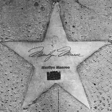 PHOENIX, USA - June 14, 2012: The name of stars in copper reflect the past glory of the Hotel San Carlos  in Phoenix, USA. The stars in the sidewalk were put in in 1993 to commemorate the visits of luminaries of their day.のeditorial素材