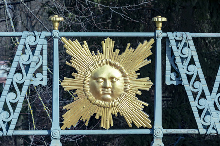 Schwetzingen, Germany - FEB 6, 2019: detail of sun at  Temple of Apollo in the Palace Gardens of...