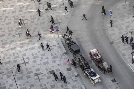 VieNNA, AUSTRIA - FEB 15, 2019: fiaker at stephans place in Vienna wait for tourists to have a...