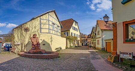 MARKTHEIDENFELD, GERMANY - MAR 30, 2019:  scenic old road with cobble stone and half timbered houses in Marktheidenfeld, Germany with fountain.のeditorial素材