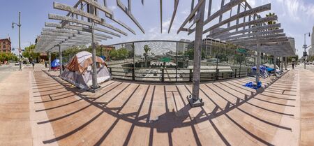 LOS ANGELES - USA, MAY 3, 2019:  homeless people live in Los ANgeles in tents at the highway bridge. In 2018 58,000 homeless people live in Los Angeles County.のeditorial素材
