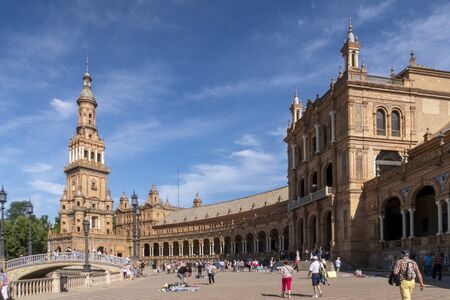 Sevilla, Spain - MAY 23, 2019: people enjoy the summer day at beautiful Plaza de Espana in Seville. Andalusia, Spain.のeditorial素材