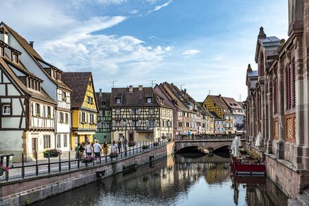 Colmar, France - June 4, 2019: Colorful traditional french houses on the side of river Lauch in Petite Venise, Colmar, Franceのeditorial素材