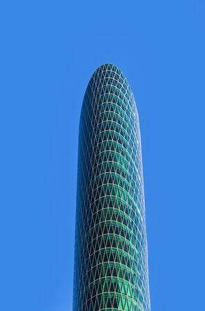 FRANKFURT - FEBRUARY 5: westhafen tower in the harbor area at February 5,2012 in Frankurt, Germany. The West harbor Tower won the famous Martin-Elsaesser-plate in 2004 due to his unique architecture.のeditorial素材