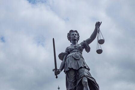 statue of lady justice in Frankfurt, Germanyの写真素材