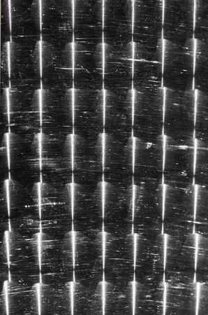 sun reflection in detailon a metal deskの写真素材